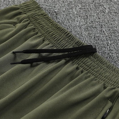 Strikers Club™ 2025/26 Real Madrid Dark Olive Premium Football Tracksuit